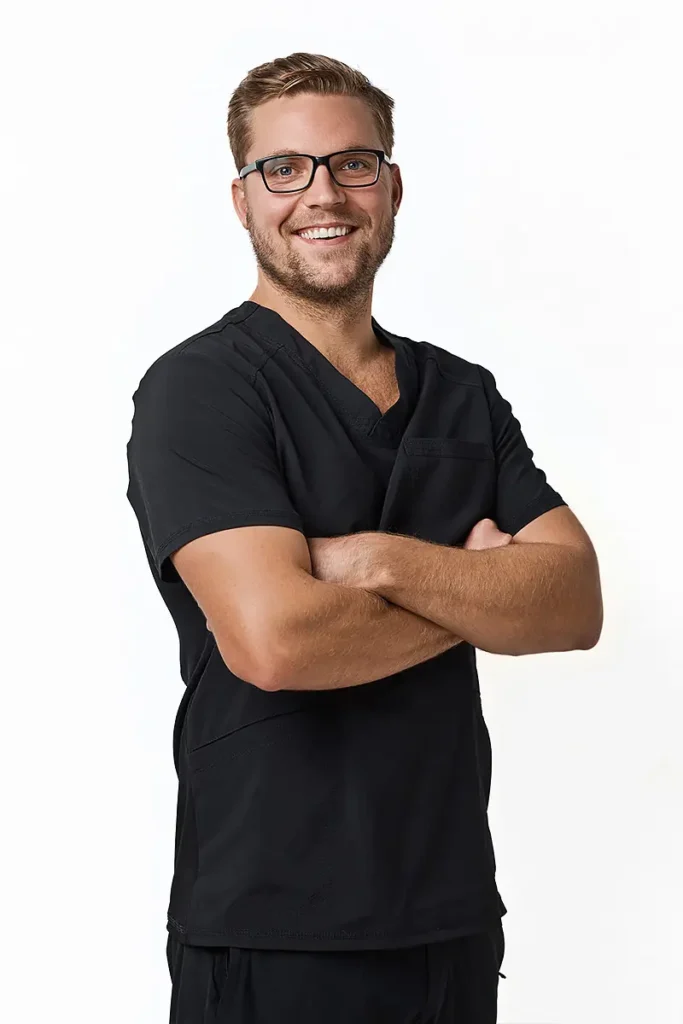 Portrait of Dr. Connor F. E. Gorman, General Dentist at Landmark Dental, inspired by a personal experience with emergency care and passionate about making a positive impact early in his career.