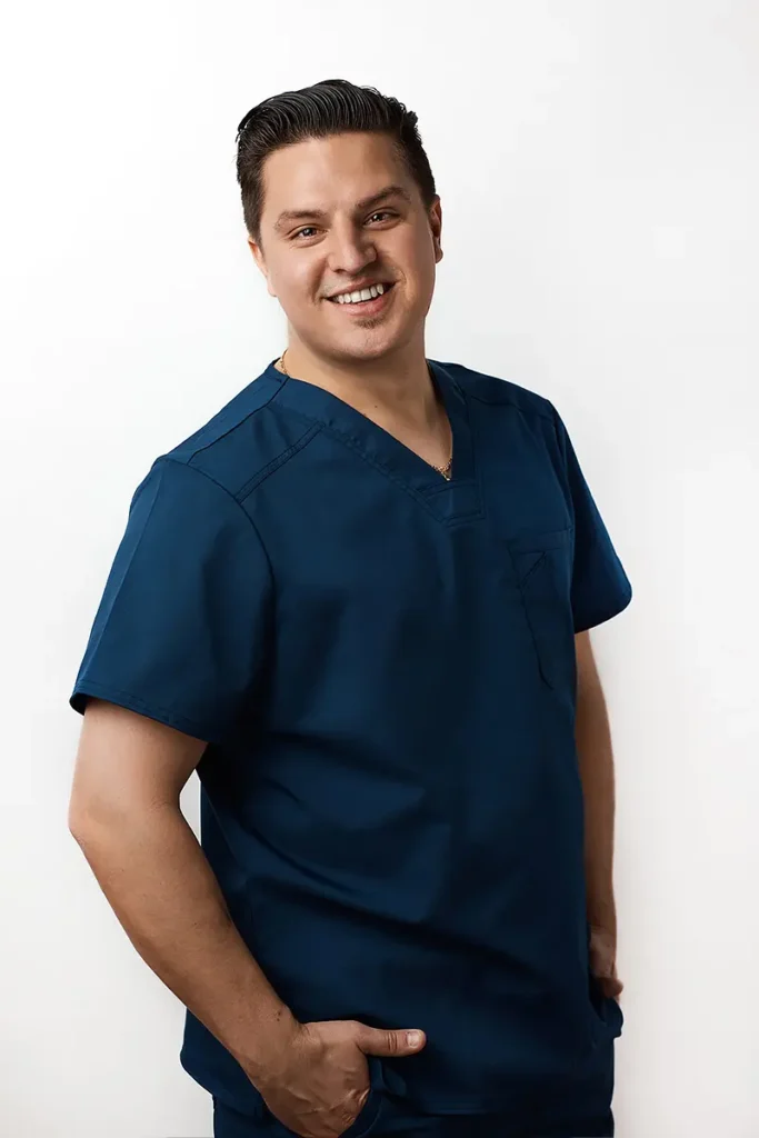 Portrait of Dr. Derek B. Friesen, General Dentist at Landmark Dental, combining his passions for music and dentistry with a detail-focused, relationship-based approach to patient care.