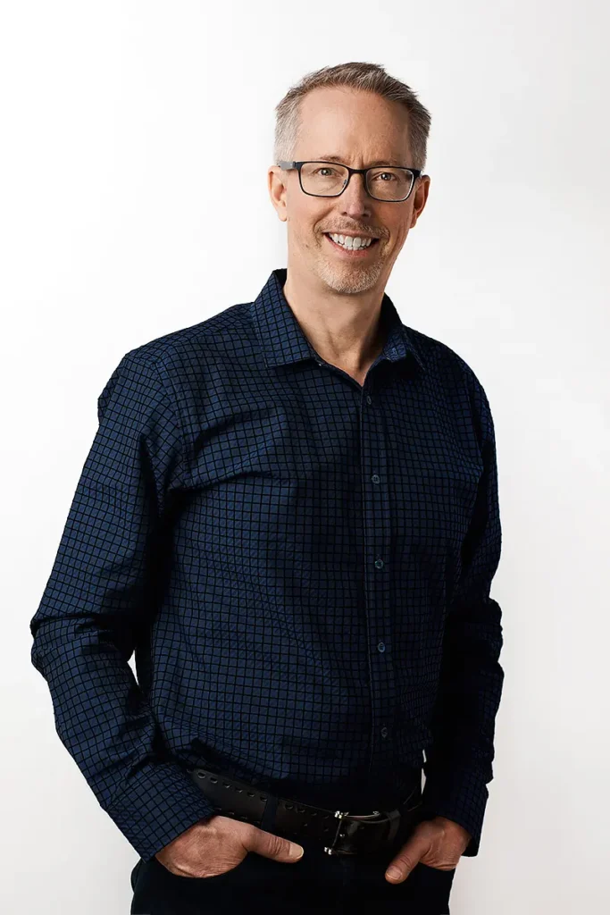 Portrait of Dr. Michael Cheetham, General Dentist at Landmark Dental, known for his attentive care, focus on patient confidence, and passion for esthetic and orthodontic dentistry.
