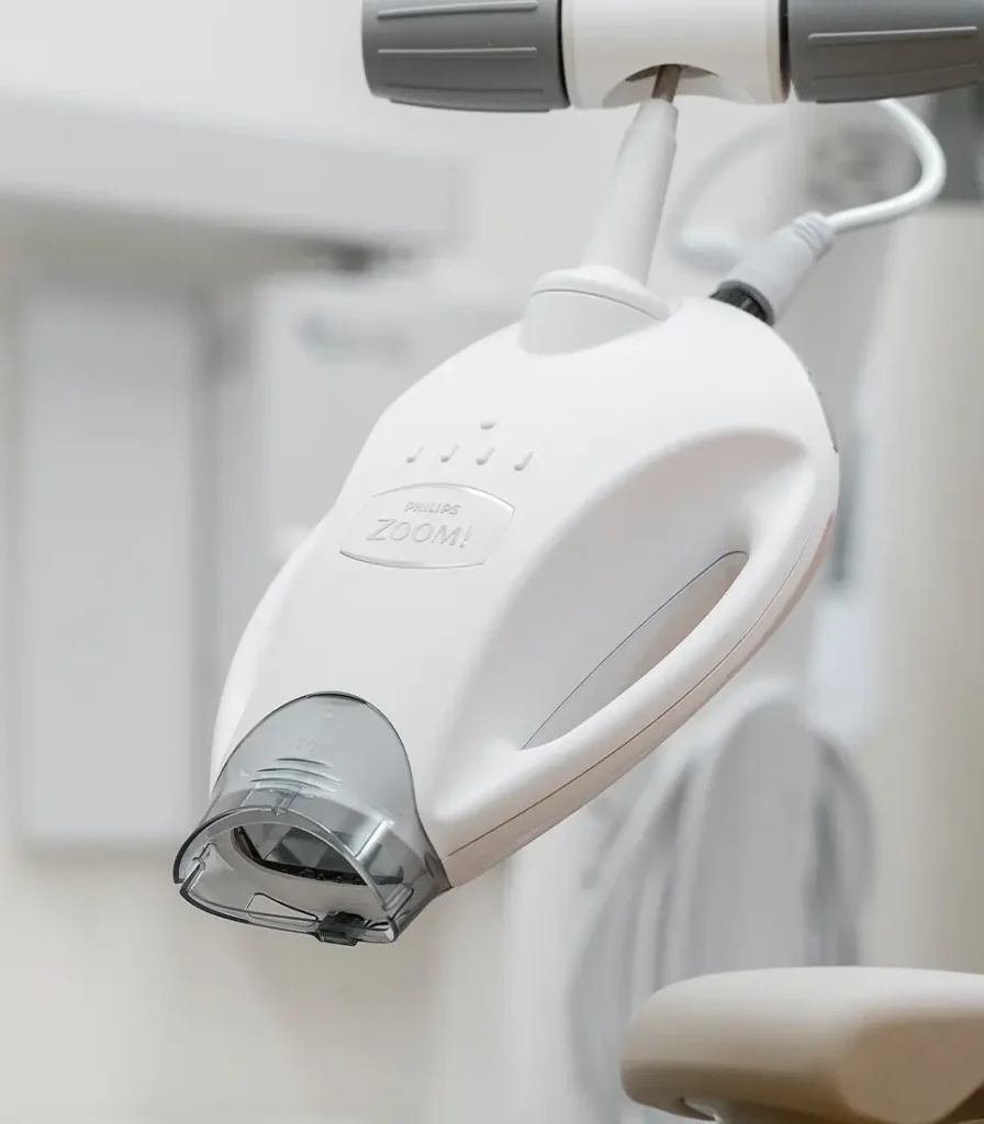 Close-up of Philips Zoom! LED light used for professional in-office teeth whitening at Landmark Dental.